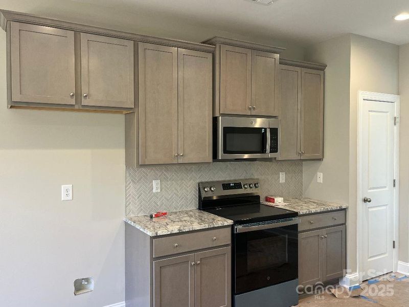 Furnished interior view inside a new home in , Concord (Image 5).