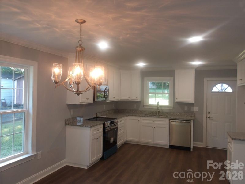 Furnished interior view inside a new home in , Oakboro (Image 3).