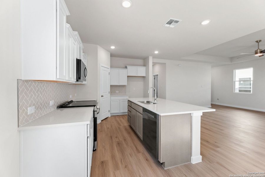 Furnished interior view inside a new home in , New Braunfels (Image 8).