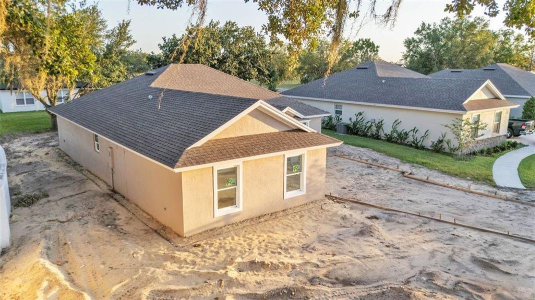 Front exterior of a new home in , Bartow, FL, highlighting curb appeal (Image 21).
