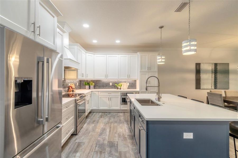 Furnished interior view inside a new home in The Isles at Venetian Bay, New Smyrna Beach (Image 14).