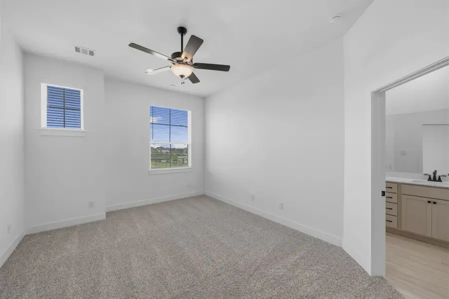 Representative unfurnished interior of a home built from the Margaux by Chesmar Homes in Bridgeland Chateau, Cypress (Image 44).
