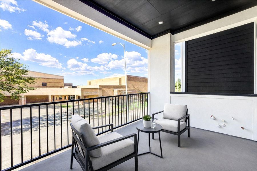 Spacious second floor balcony, perfect for outdoor relaxation.