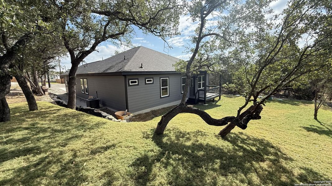 Exterior details and patio area of a home in , Spring Branch (Image 26). Exterior details and patio area of a home in , Spring Branch (Image 26).