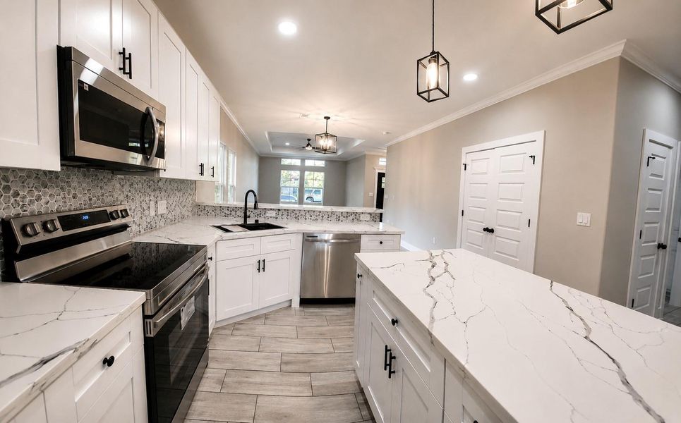 Furnished interior view inside a new home in , Freeport (Image 7).