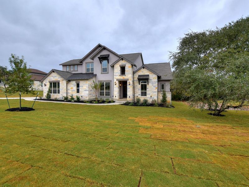 Representative exterior photo of a completed home built from the Madera II by Giddens Homes in Scofield Farms Estates, Georgetown, TX (Image 57).