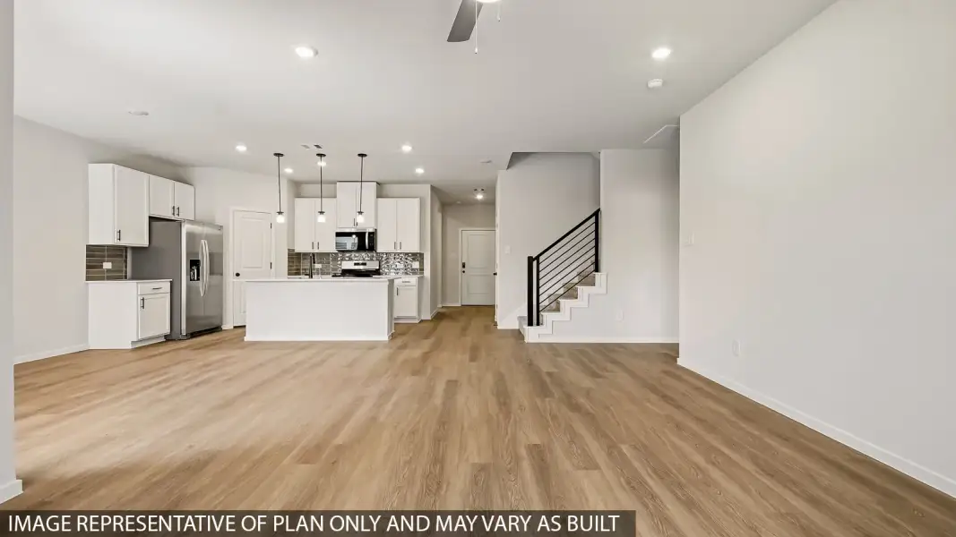 Spacious, unfurnished interior of a new home in Sunterra, Katy (Image 11).