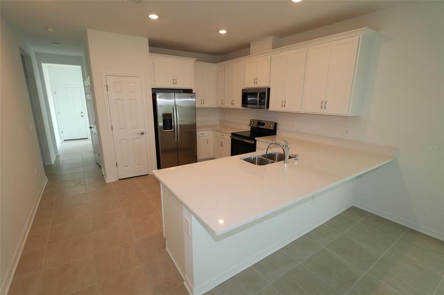 Furnished interior view inside a new home in , Sarasota (Image 8).