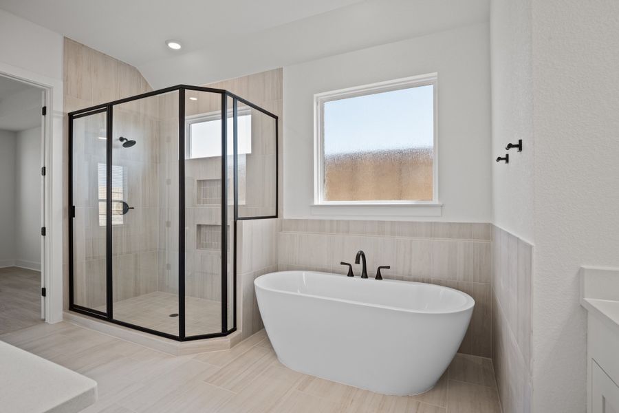 Representative furnished interior of a home built from the Farris by Chesmar Homes in The Grove at Blackhawk, Pflugerville (Image 6).