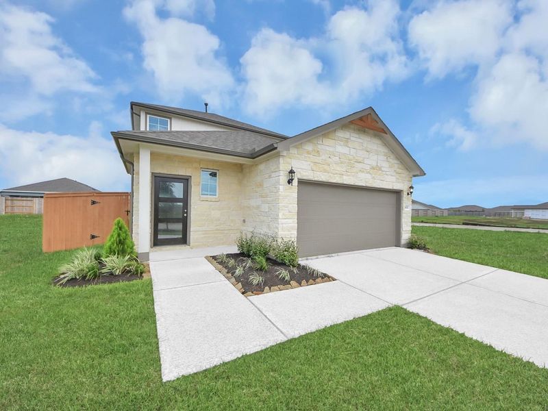 Front exterior of a new home in Emberly, Beasley, TX, highlighting curb appeal (Image 2). Front exterior of a new home in Emberly, Beasley, TX, highlighting curb appeal (Image 2).