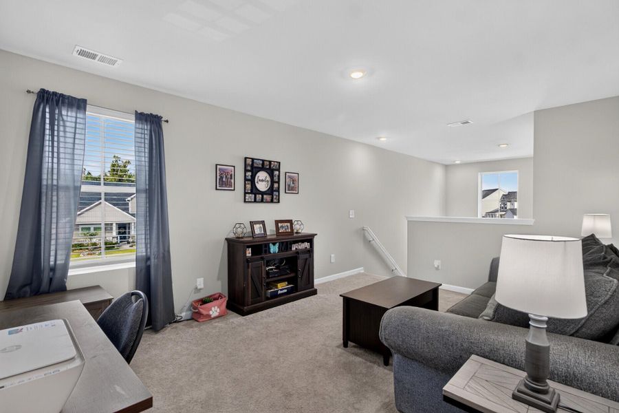Furnished interior view inside a new home in Lindera Preserve at Cane Bay Plantation, Summerville (Image 30).