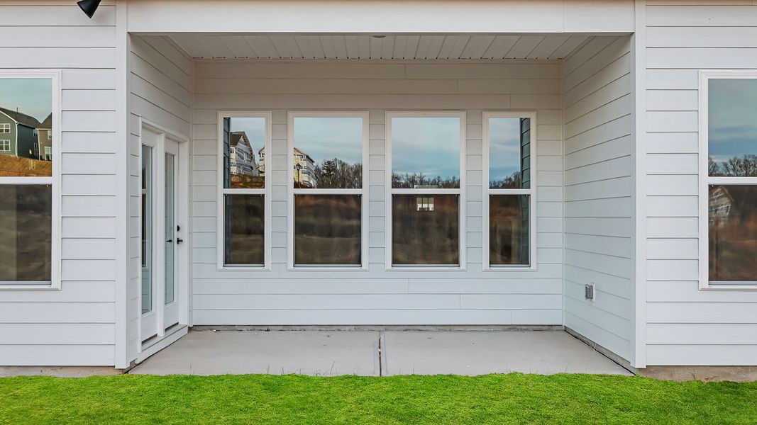 Exterior details and patio area of a home in Whitehawk Meadows, Travelers Rest (Image 3).