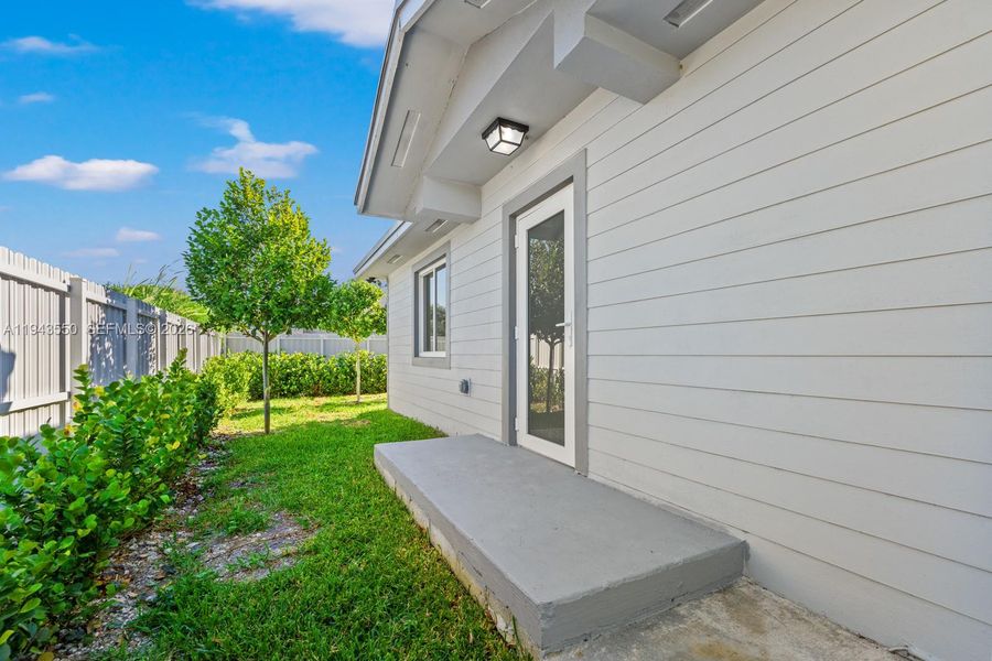Exterior details and patio area of a home in , Florida City (Image 3).