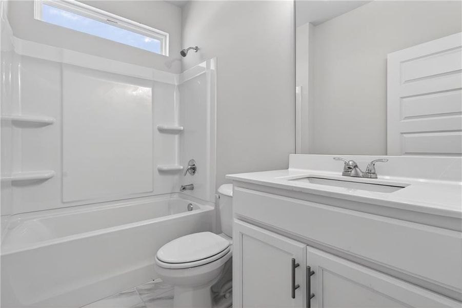 Furnished interior view inside a new home in Waters Edge, Mansfield (Image 9).