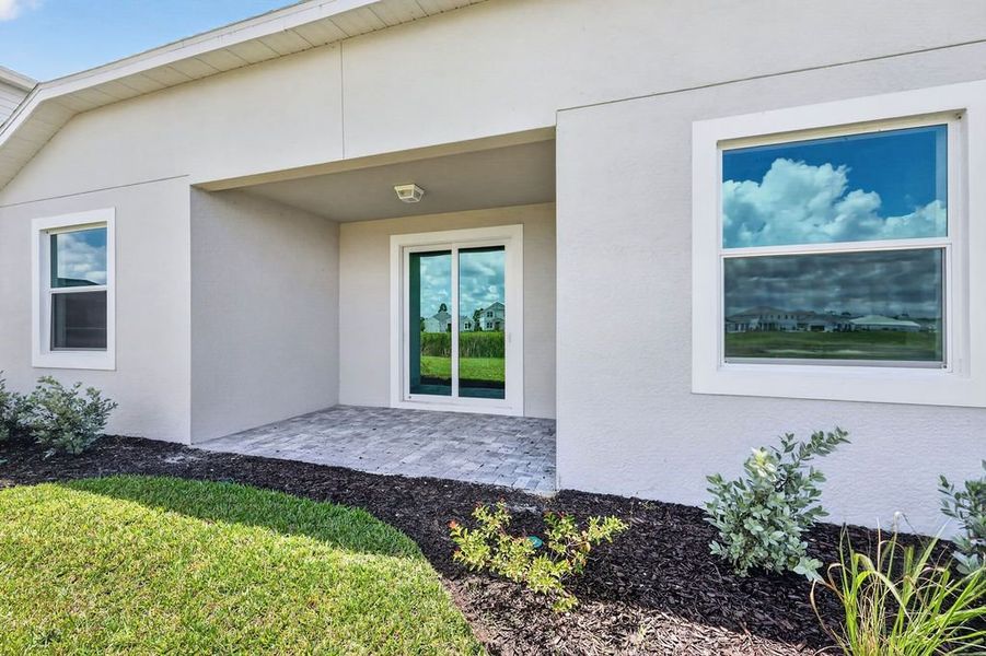 Exterior details and patio area of a home in The Sanctuary – Resort Collection, Punta Gorda (Image 4). Exterior details and patio area of a home in The Sanctuary – Resort Collection, Punta Gorda (Image 4).