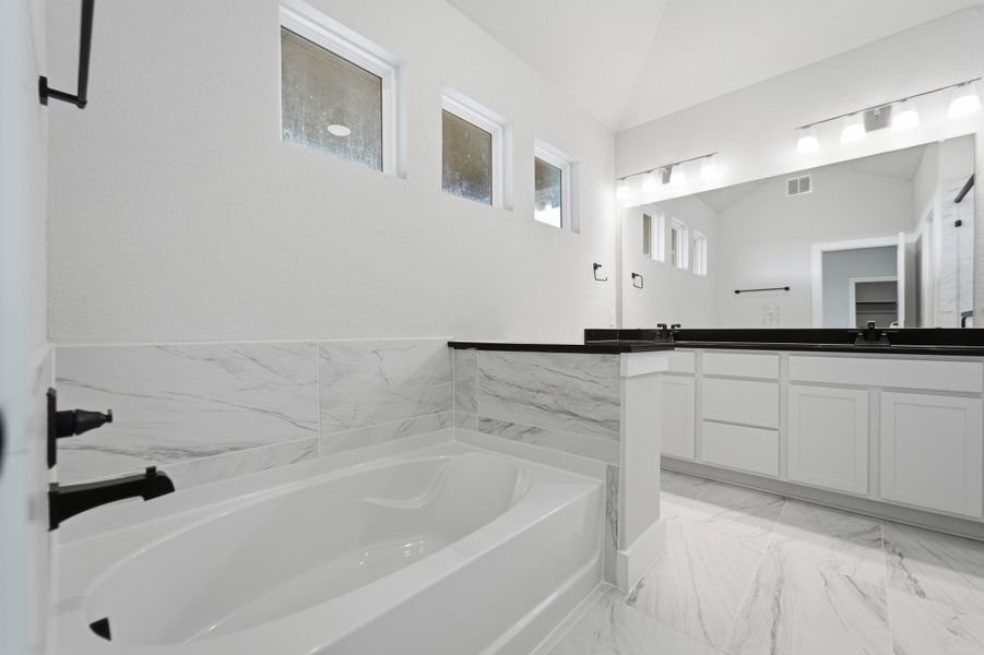Furnished interior view inside a new home in The Woodlands at Medina Hills, Mico (Image 7).
