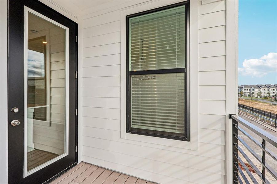 Exterior details and patio area of a home in Parkview at Hamlin, Winter Garden (Image 13).