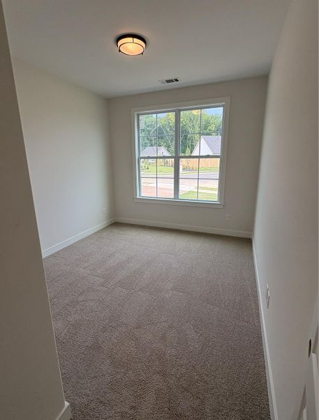 Spacious, unfurnished interior of a new home in Villages of Green Meadows, Munford (Image 14).