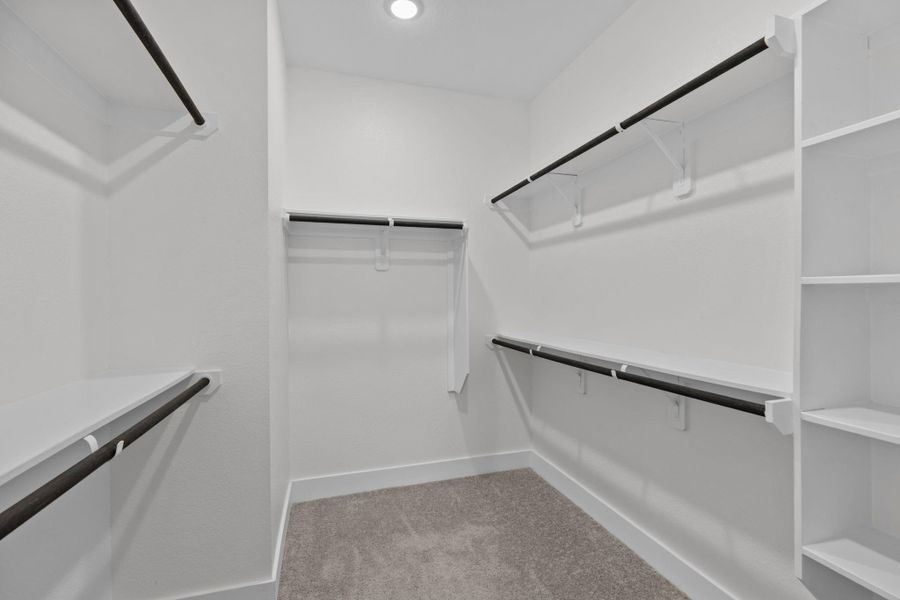 WOW! What a great walk in closet in primary bedroom.