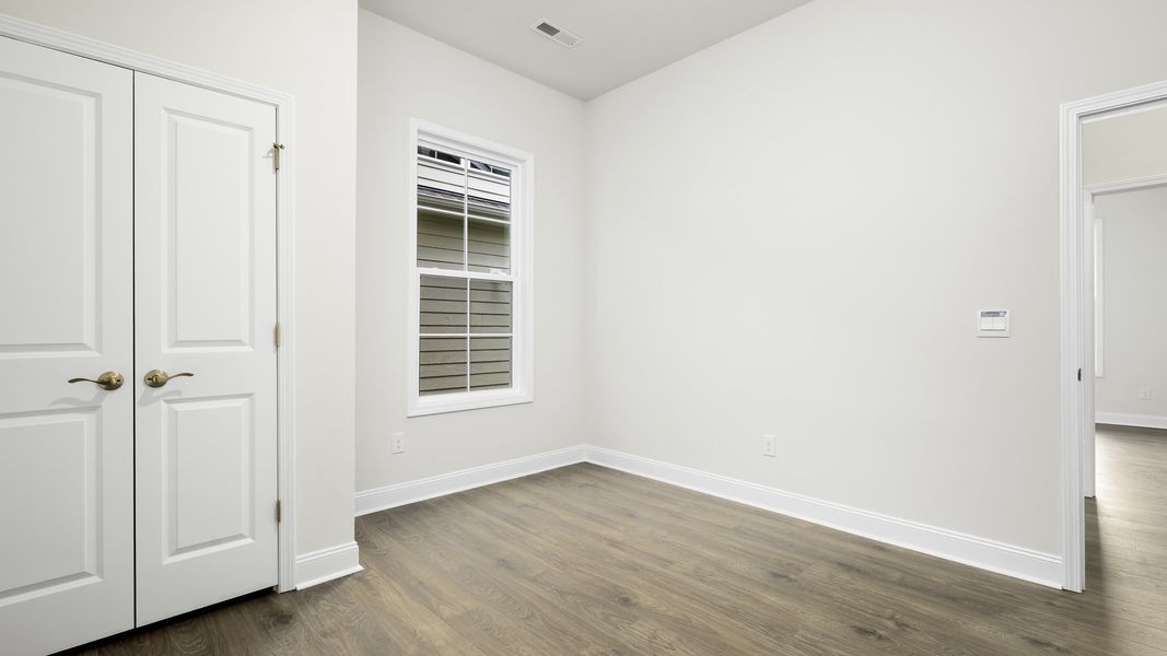 Spacious, unfurnished interior of a new home in The Villas at Kinsley, Jamestown (Image 10).