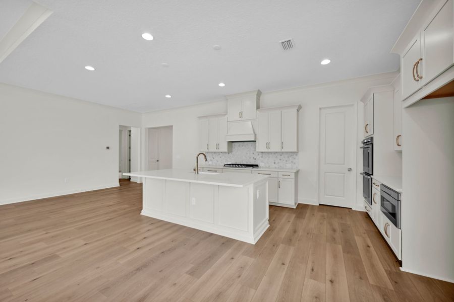 Representative furnished interior of a home built from the Hudson II by Riverside Homes in Hidden Creek at SilverLeaf 70' Series, St. Augustine (Image 11).