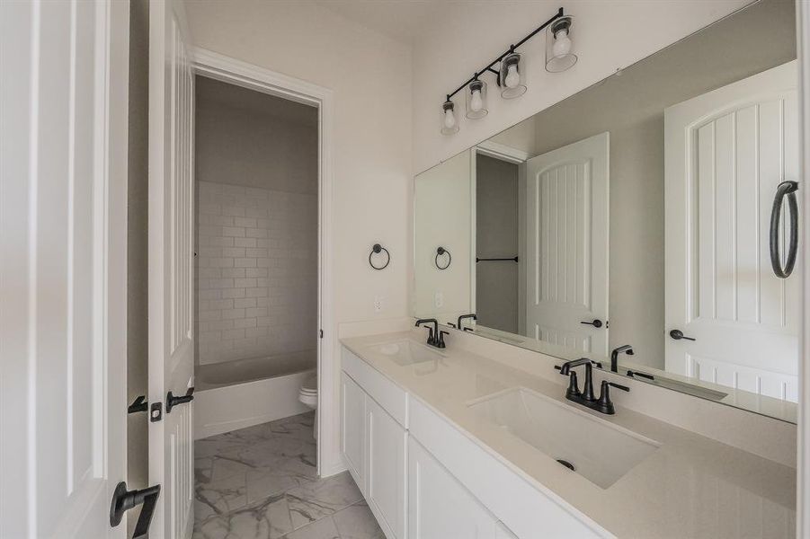Furnished interior view inside a new home in Matthews Farms, Venus (Image 11).