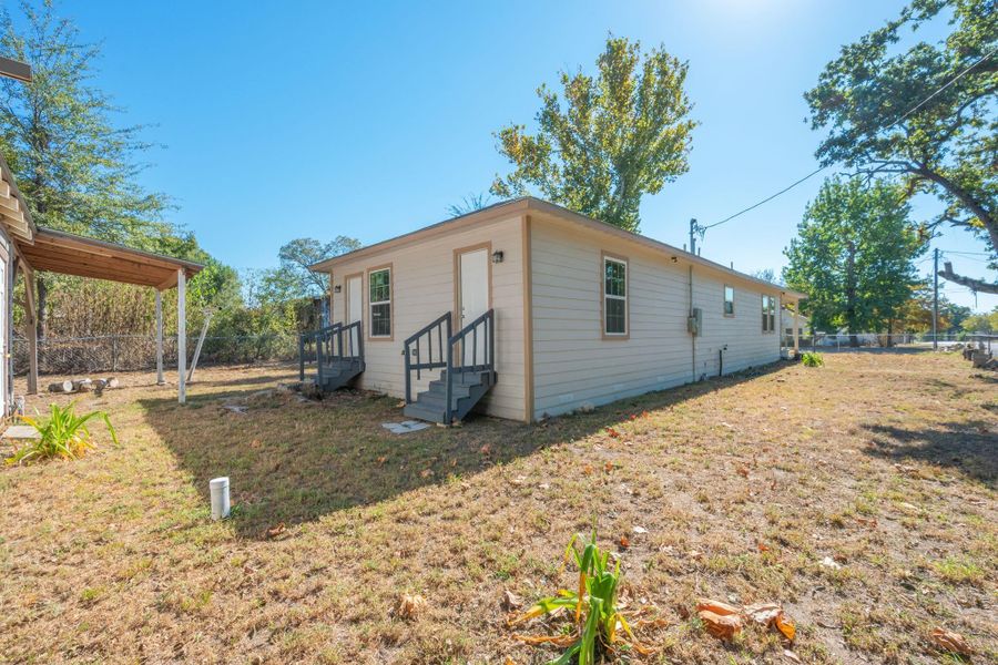 Exterior details and patio area of a home in , Hearne (Image 13). Exterior details and patio area of a home in , Hearne (Image 13).