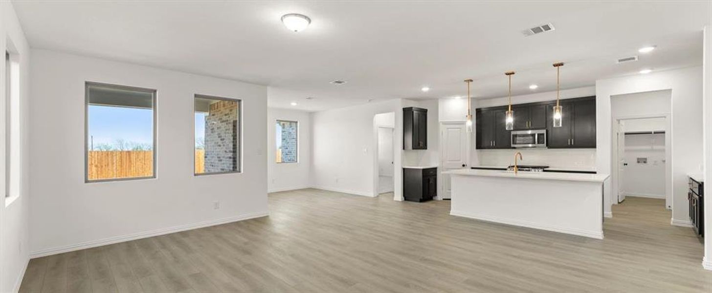 Open Kitchen-Living-Dining Room featuring the Oxford Collection