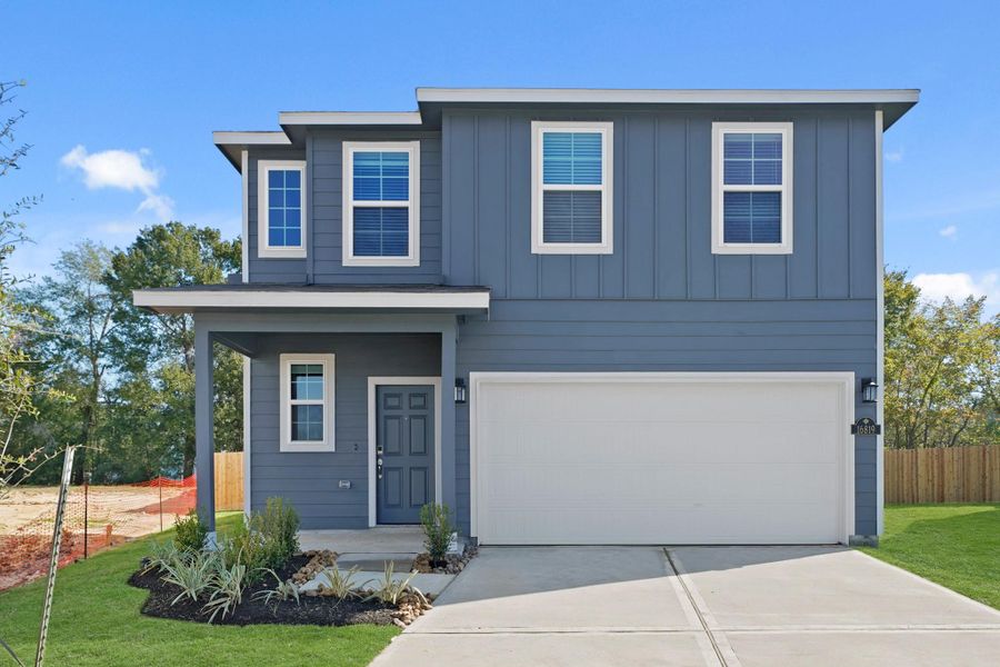 Front exterior of a new home in Maple Heights, Porter, TX, highlighting curb appeal (Image 2).