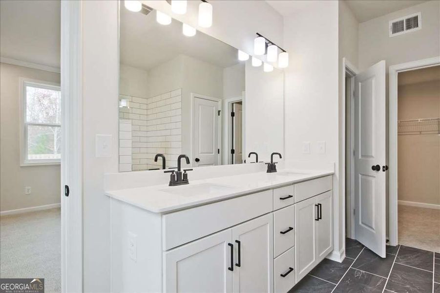 Furnished interior view inside a new home in The Paddocks at Doc Hughes, Buford (Image 5).