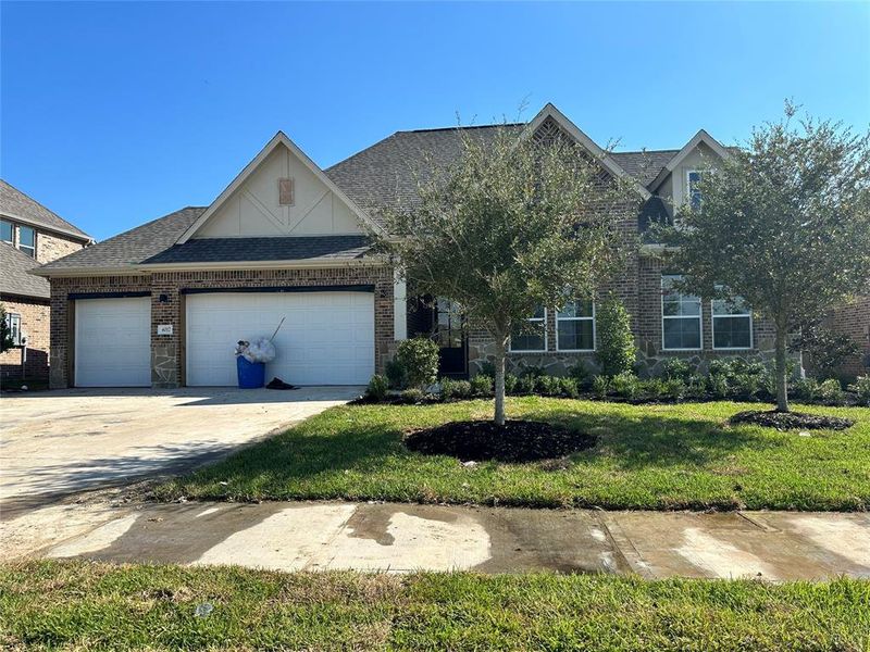 One-story home with 4 bedrooms, 2.5 baths and 4 car tandem garage