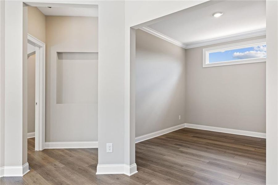 Spacious, unfurnished interior of a new home in The Courtyards at Bailey Farm, Dacula (Image 12).