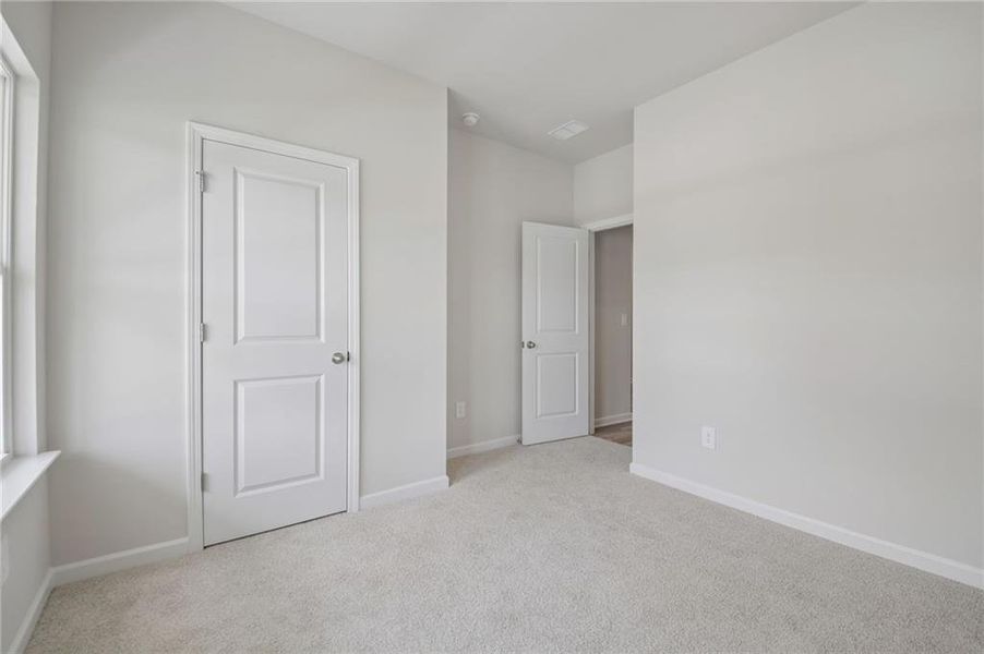 Spacious, unfurnished interior of a new home in Northwoods at Mirror Lake, Villa Rica (Image 33).