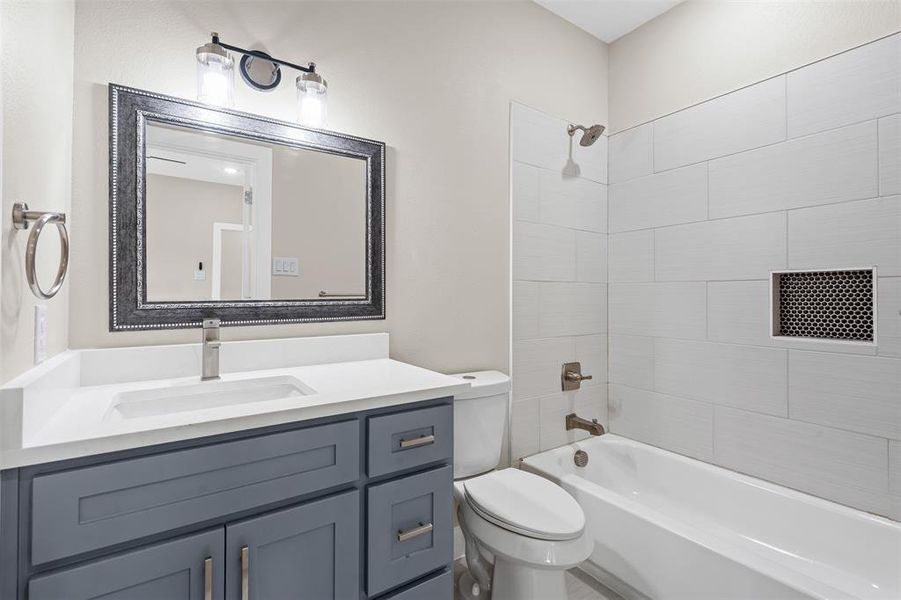 Bathroom with tub / shower combination and vanity Bathroom with tub / shower combination and vanity