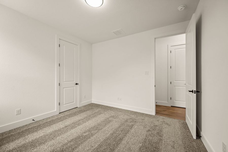 Spacious, unfurnished interior of a new home in Highland Oaks, Boyd (Image 32).