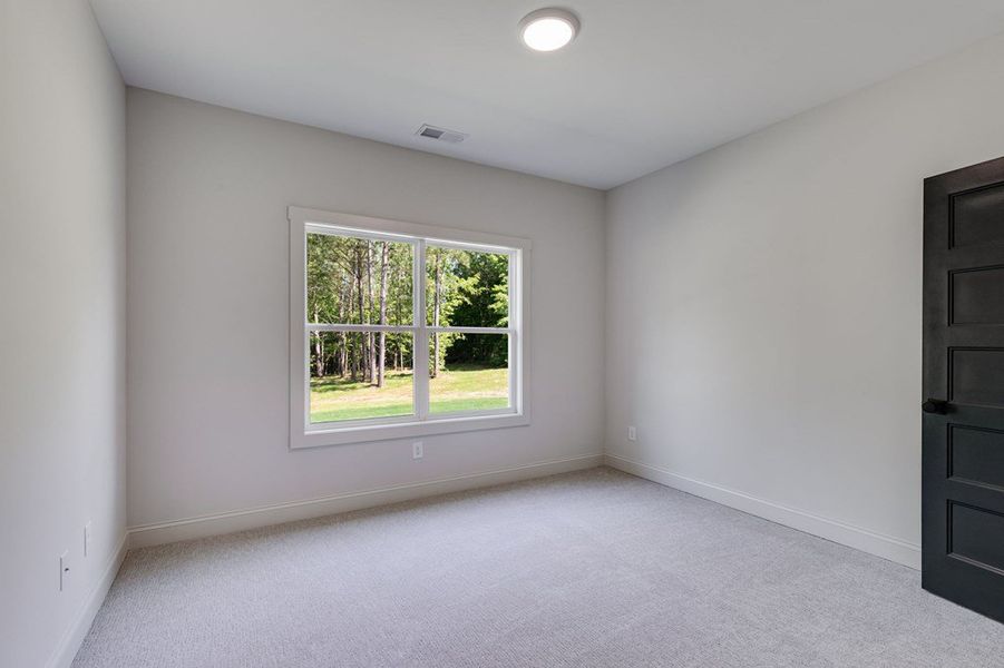 Spacious, unfurnished interior of a new home in Harmon Springs, Carrollton (Image 37).