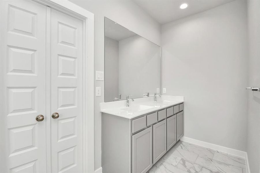 Step into a sanctuary of relaxation in your primary bathroom. Sample photo of completed home with similar floor plan. Actual colors and selections may vary.