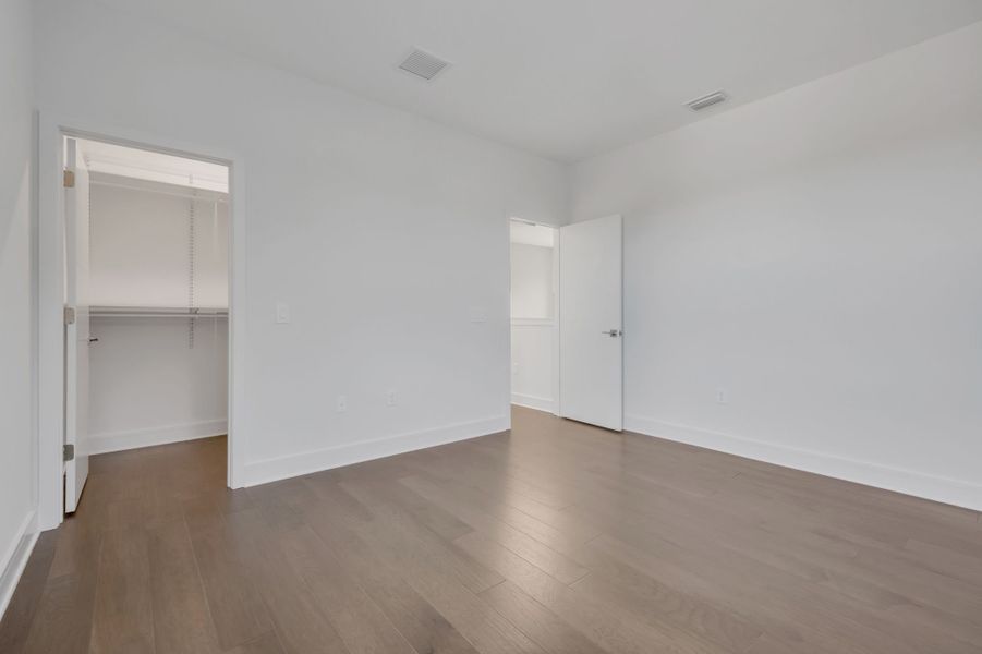 Representative unfurnished interior of a home built from the Courtyard 50 by ABD Development in Hampton Green at Providence, Davenport (Image 46).