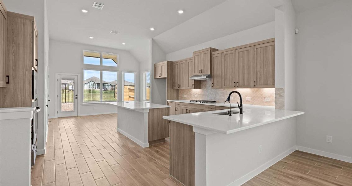 Representative furnished interior of a home built from the Marshall by Chesmar Homes in Village at Three Oaks, Seguin (Image 4).