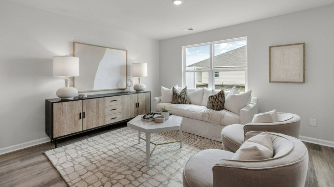 Representative furnished interior of a home built from the PEARSON TOWNHOME by D.R. Horton in Grayson Park Townhomes, Leland (Image 13).
