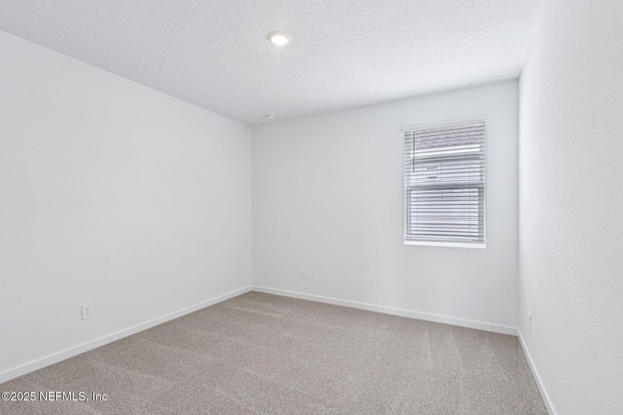 Spacious, unfurnished interior of a new home in Flagler Village - Signature Series, Palm Coast (Image 28).