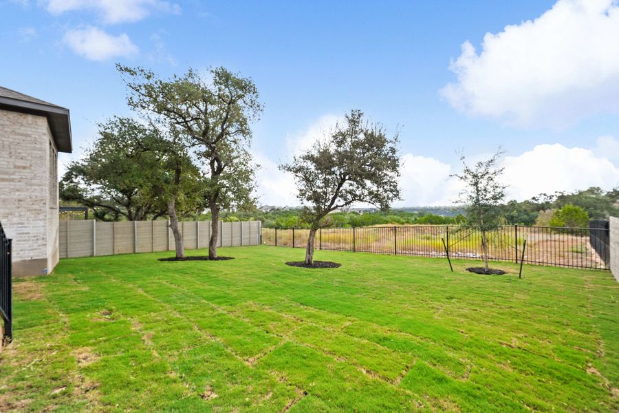 Exterior details and patio area of a home in Wolf Ranch, Georgetown (Image 31).