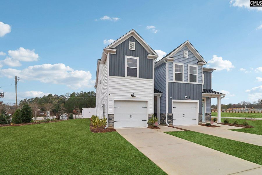 Front exterior of a new home in Walker’s Trail, Lexington, SC, highlighting curb appeal (Image 32). Front exterior of a new home in Walker’s Trail, Lexington, SC, highlighting curb appeal (Image 32).