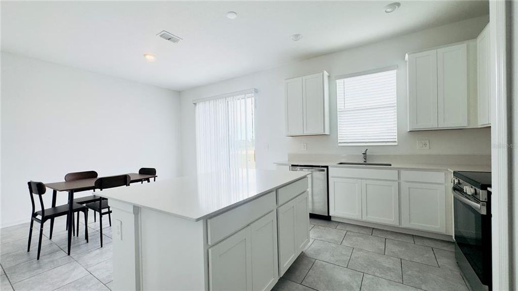 Furnished interior view inside a new home in , Davenport (Image 13).