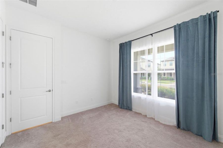 Spacious, unfurnished interior of a new home in Tamarack at Two Rivers, Zephyrhills (Image 55).