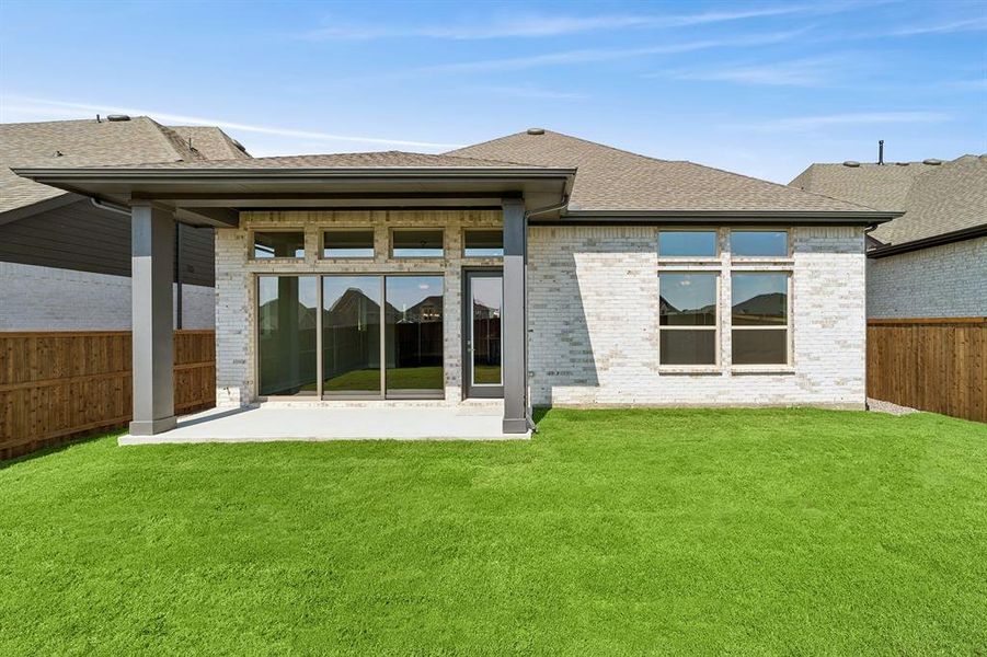 Front exterior of a new home in Sandbrock Ranch, Aubrey, TX, highlighting curb appeal (Image 2).