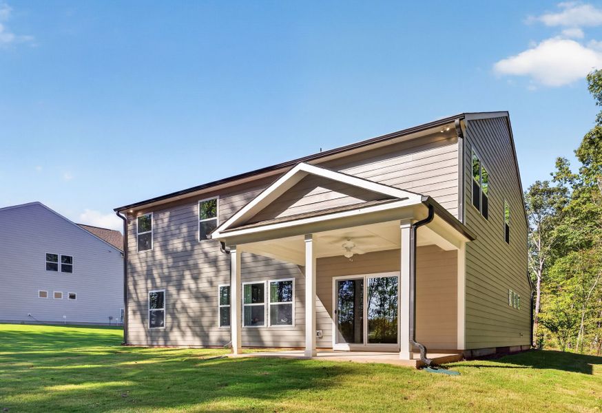 Exterior details and patio area of a home in Heritage Hall, Statesville (Image 24).
