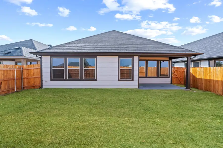 Covered Patio on the Quartz home plan by Trophy Signature Homes – REPRESENTATIVE PHOTO