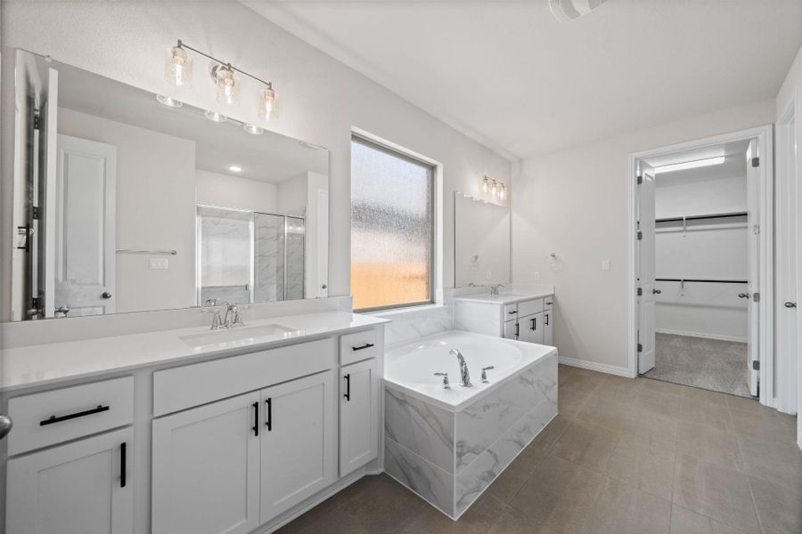 Primary Bath retreat with dual vanities & garden tub