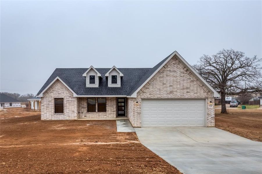 Front exterior of a new home in , Jacksboro, TX, highlighting curb appeal (Image 1). Front exterior of a new home in , Jacksboro, TX, highlighting curb appeal (Image 1).